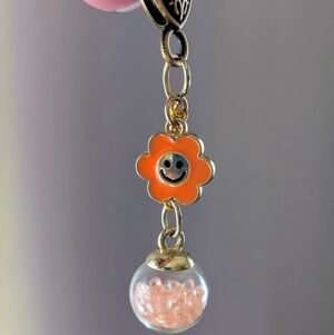 Orange Flower Charm Bag Charm With Fun Bead Globe